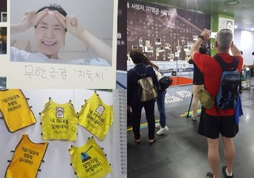 (우측)한 외국인이 사진전에 관심을 보이며 사진촬영하고 있다. = 하영인 기자