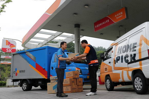홈픽은 주유소 자산 공유를 통한 모바일 택배 플랫폼이다. ⓒ 홈픽