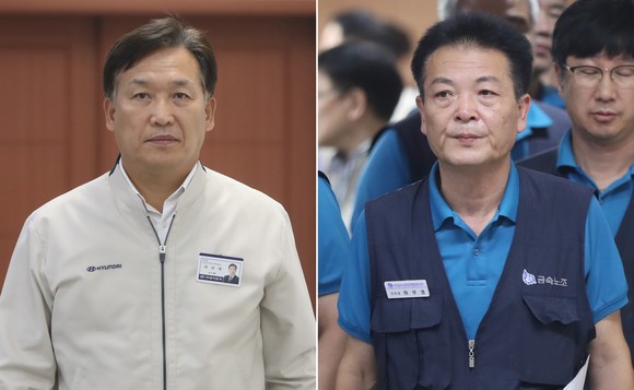 현대차 울산공장 본관 아반떼룸에서 올해 임금 및 단체협약 잠정 합의를 마친 하언태 부사장(왼쪽)과 하부영 노조 지부장(오른쪽)이 걸어 나오고 있는 모습. ⓒ 연합뉴스