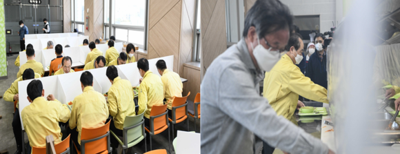 오거돈 부산시장이 구내식당에서 직접 배식 받은 뒤 칸막이가 설치된 구내식당에서 식사하고 있다. ⓒ 부산시