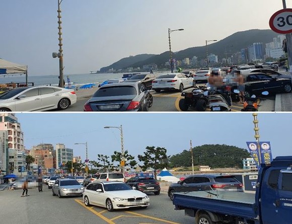 지난 25일 피서객들이 몰고 나온 차량들이 송정해수욕장 갓길에 불법주차를 하면서 일대의 교통체증이 극심했다. ⓒ 프라임경제