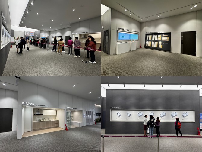 2층 로비 전경. 기본 마감재와, 유니트, 플랜 안내 패널이 자리하고 있다. = 김주환 기자