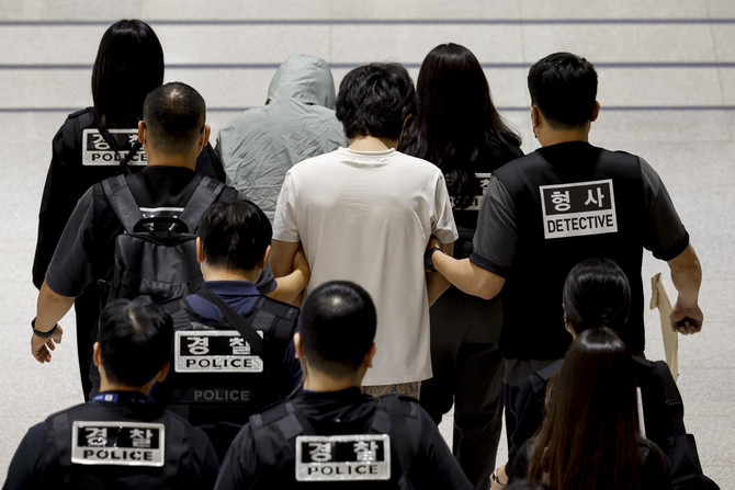 캄보디아 온라인 사기에 가담해 구금된 한국인들이 지난달 18일 오전 인천국제공항 제2터미널을 통해 송환되고 있다. ⓒ 연합뉴스