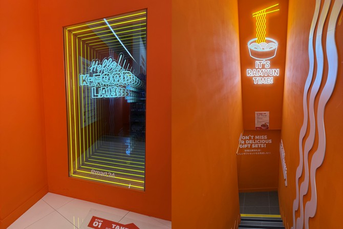 2층에 마련된 '인피니티 월' 포토존(왼쪽)과 2층에서 1층으로 내려가는 계단 모습. = 이인영 기자